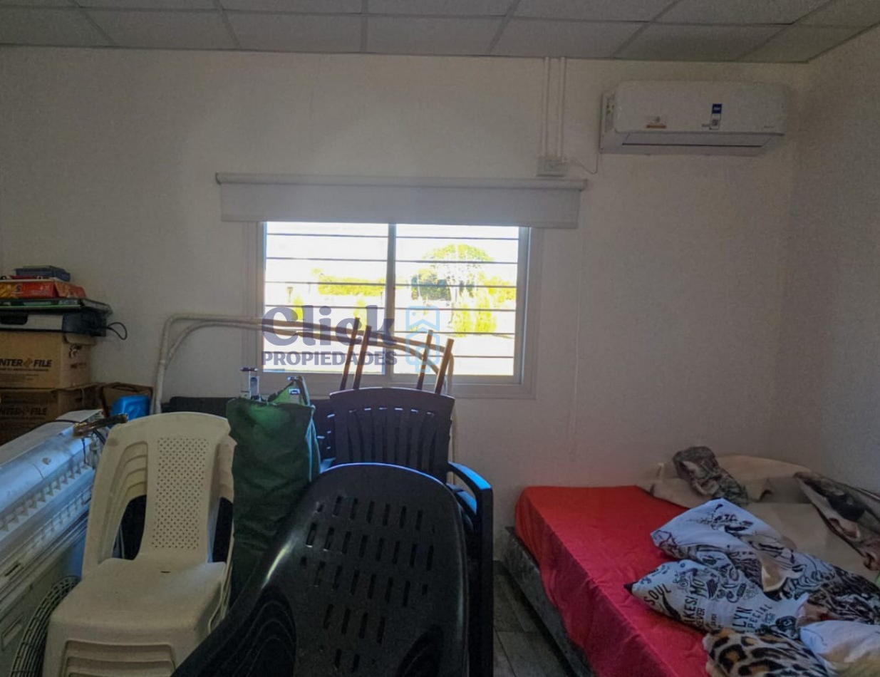 Quincho con potencial en barrio privado